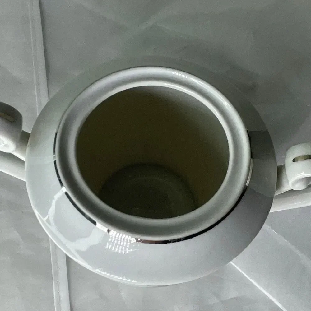 Vintage Hakusan Rikisha pattern porcelain sugar bowl with lid.